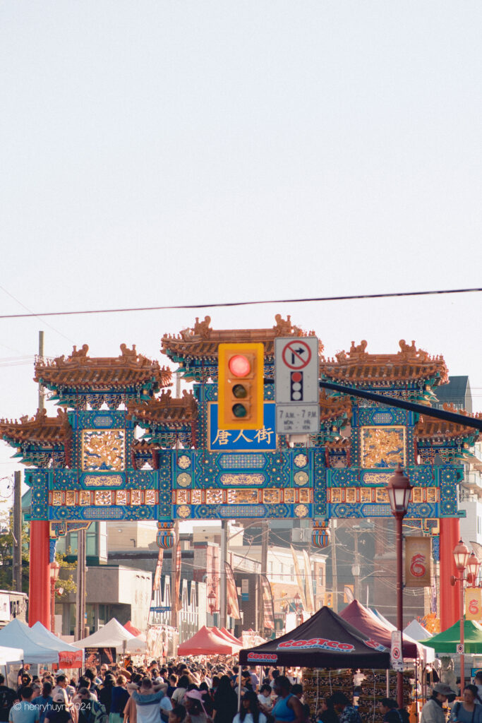 Chinatown Royal Gateway bustling with people during the vibrant Night Asian Market.